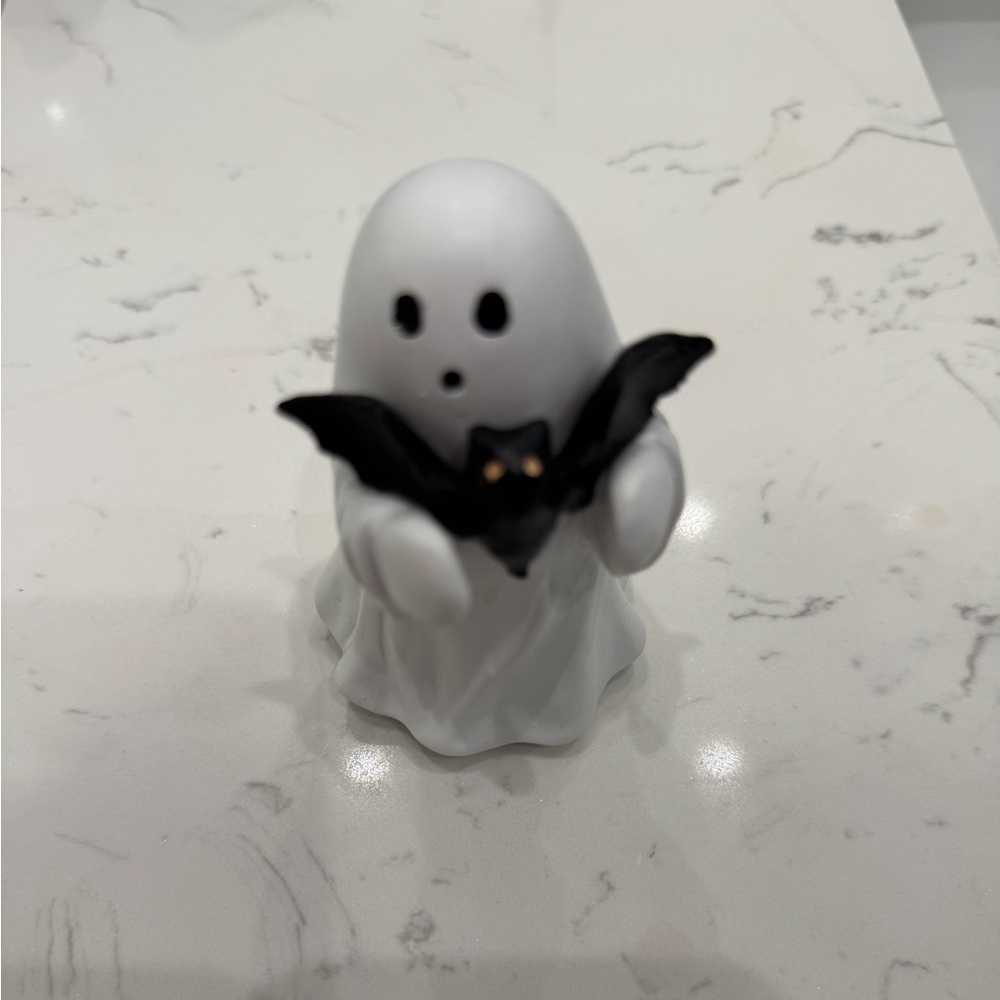 Boo and bat statue